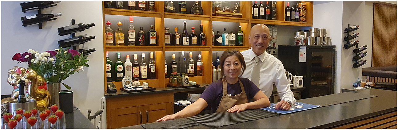 John & Catherine behind the bar